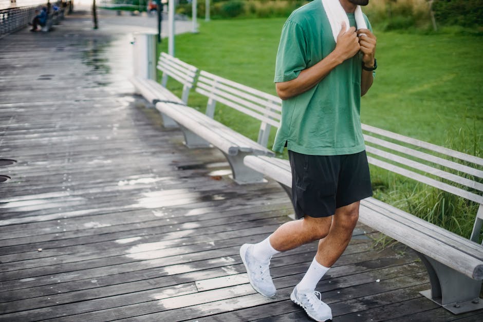 Athlètes courant sur la plage lors d'une compétition de sprint